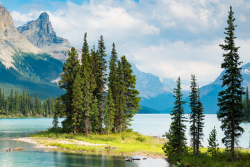 Fototapeta na wymiar Beautiful Spirit Island in Maligne Lake in famous Jasper National Park West Canada