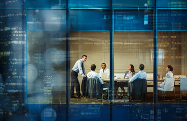 Corporate business people meeting in highrise conference room