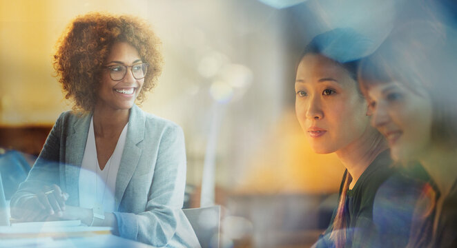 Smiling businesswoman in meeting