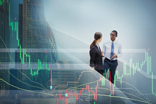 Graph over business people and highrise buildings