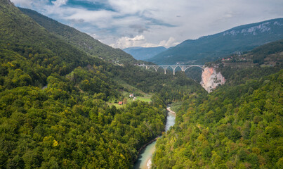 Djurdzhevich Bridge. Montenegro. Reinforced concrete arch bridge across the Tara river from a height