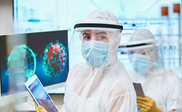 Portrait confident female scientist researching coronavirus