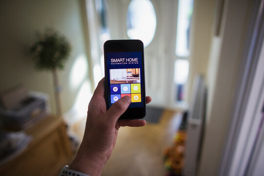 POV Man accessing home automation from smart phone