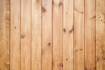 Natural wooden wall made of uncolored pine wood