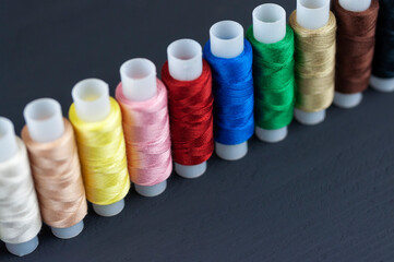 thread palette on a black background