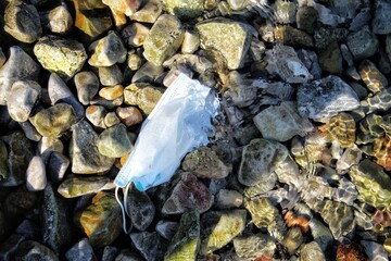 Covid mask on beach