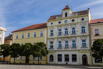 Fototapeta premium Colorful historical buildings in the center of Duchcov in sunny day. Duchcov, Northern Bohemia, Czech Republic
