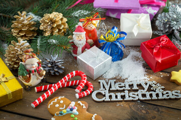 Merry Christmas, postcard with gifts and Christmas decorations.