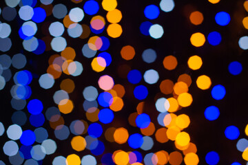 Defocused Blue and Gold abstract bokeh lights background.