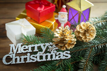 Merry Christmas, postcard with gifts and Christmas decorations.