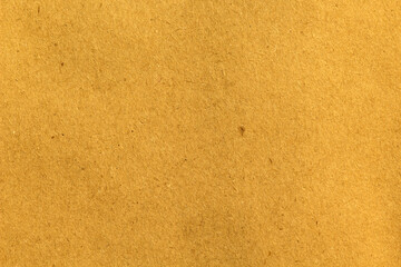 Fototapeta na wymiar Old yellow eco recycled kraft paper texture cardboard background