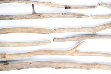 Set of different sizes and forms driftwood sticks isolated on white background. Natural materials.