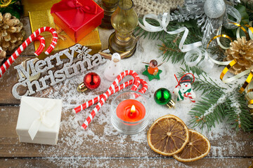 Merry Christmas, postcard with gifts and Christmas decorations.