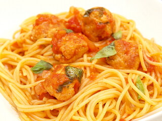 Spaghetti with meatballs in tomato sauce