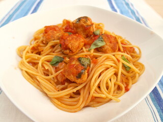 Spaghetti with meatballs in tomato sauce