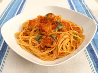 Spaghetti with meatballs in tomato sauce