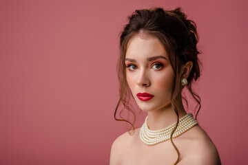 Beauty, fashion portrait of young beautiful woman with pink, fuchsia, color eyes, lips makeup,...