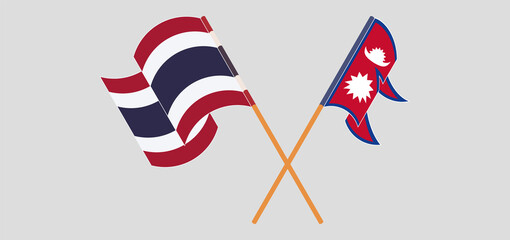 Crossed and waving flags of Nepal and Thailand