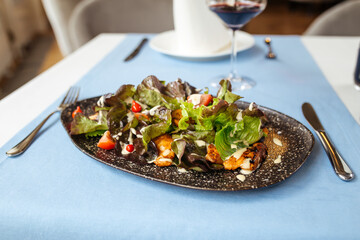 Chicken salad with greens and white sauce