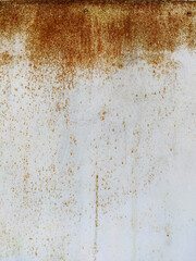Corroded metal background. Rusty metal background with streaks of rust. Rust stains. Rystycorrosion.