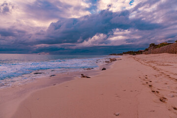 Saint Maarten, Caribbean - January 18 2020:
  Caribbean beach of Saint Maarten island at sunset