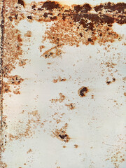 Corroded metal background. Rusty metal background with streaks of rust. Rust stains. Rystycorrosion.