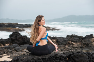Fototapeta na wymiar Yoga at the beach