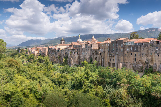 View of Sant'Agata de Goti in Bevenento in Italy with clouds trees and buildings