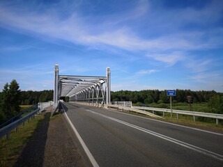 Fototapeta na wymiar Bridge over the Narew river, Podlasie, Polska