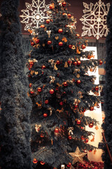 Christmas tree in vintage red orange gold toned colors as Christmas holidays background   