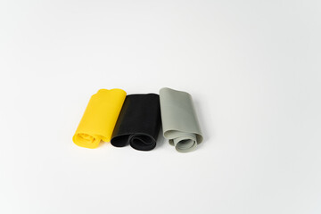 Black, Grey and Yellow Weight Bands, for Fitness Training in Gym.