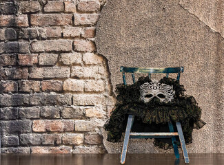 Stone Wall with Chairs and Flowers