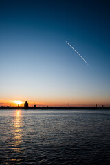 Liverpool, UK. Beautiful colorful long exposure shot of river Mersey from Albert Dock with smooth reflections of night lights from the other side of a shore. 