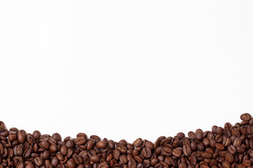 Frame made of coffee beans. Pattern from roasted coffee beans. Template coffee pad.