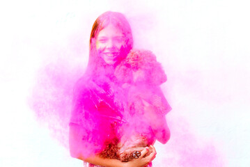 happy girl with dog painted with Holi festival colours on white wall background