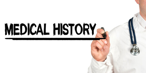 Doctor writes the word - MEDICAL HISTORY. Image of a hand holding a marker isolated on a white background.