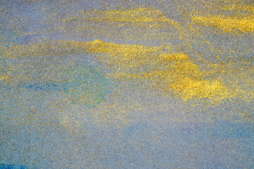 Grunge watercolor background on paper stains of shiny paint with blue.