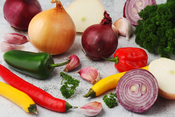 Different spices: onion. garlic, parsley and pepper