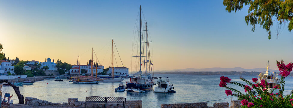 Panoramic view of sailboats at the old port of Spetses located on the Spetson-Moni Agion Anargiron road, Spetses, Greece.