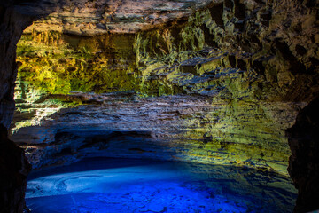 Beautiful colors in a cave with lagoon