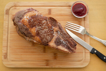 Prime rib cooked on a cutting board