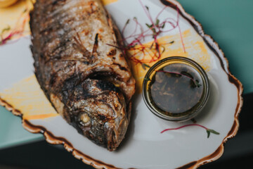  grilled fish on a plate