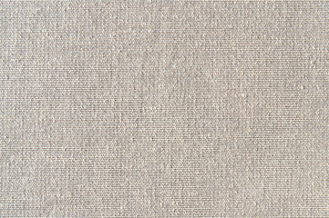 Fototapeta na wymiar Closeup light brown or beige color fabric texture. Beige Fabric pattern design or upholstery abstract background.