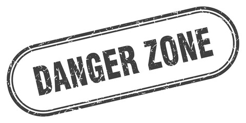 danger zone stamp. rounded grunge textured sign. Label