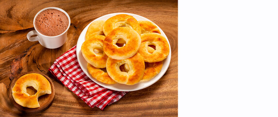 Pandequeso traditional Colombian food - Hot drink chocolate.