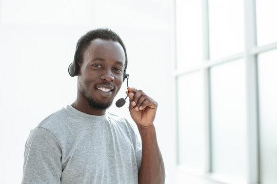close up. a handsome young man with a headset.