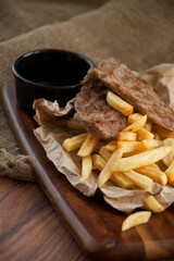 french fries with meat and sauce
