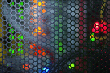 Close up of mesh on server rack door in data center.