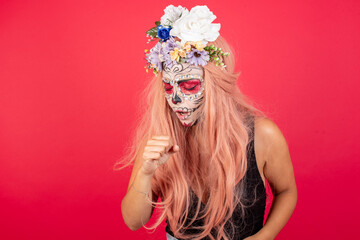 young beautiful woman wearing halloween make up over red studio background feeling unwell and coughing as symptom for cold or bronchitis. Healthcare concept.