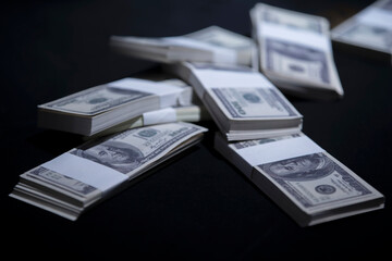 Stack of dollars on dark background.soft focus.